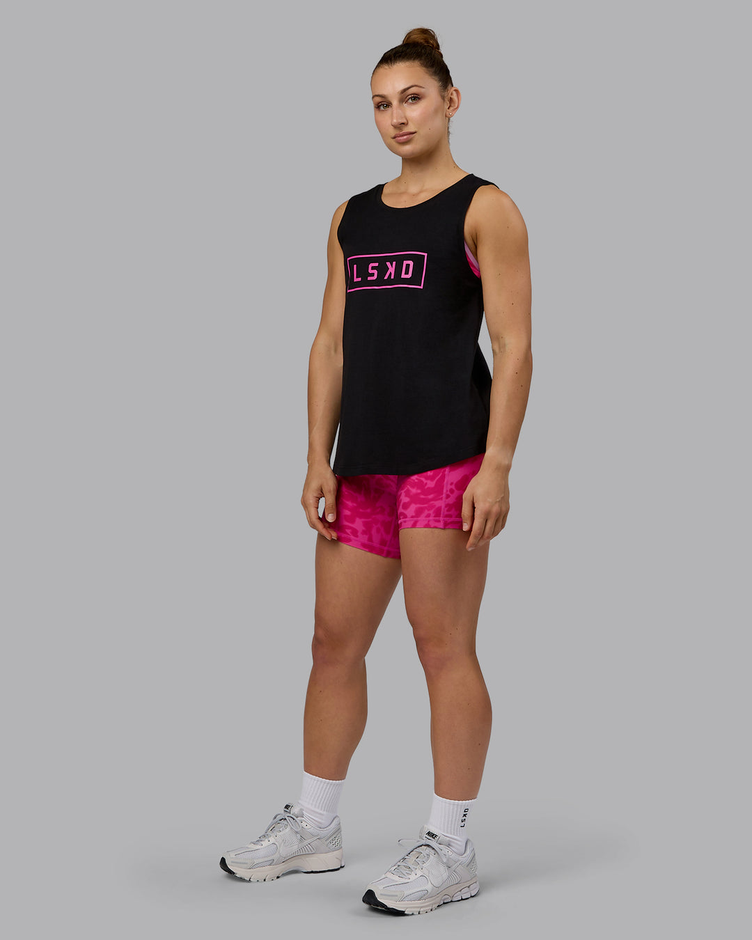 Woman wearing Luna FLXCotton Longline Tank - Black-Ultra Pink - view 5