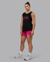 Woman wearing Luna FLXCotton Longline Tank - Black-Ultra Pink | Thumbnail Index: 4