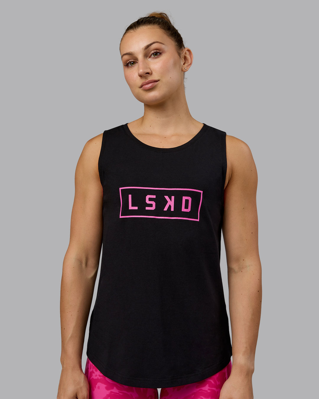 Woman wearing Luna FLXCotton Longline Tank - Black-Ultra Pink - view 2