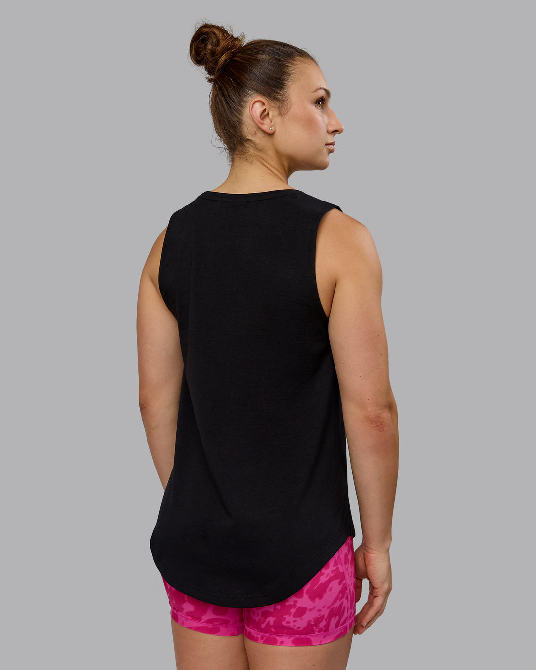 Woman wearing Luna FLXCotton Longline Tank - Black-Ultra Pink - view 3