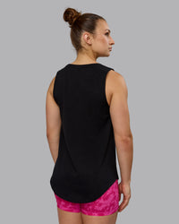 Woman wearing Luna FLXCotton Longline Tank - Black-Ultra Pink | Thumbnail Index: 2