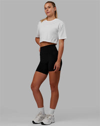 Woman wearing MVP Heavyweight Cropped Tee - White | Thumbnail Index: 1