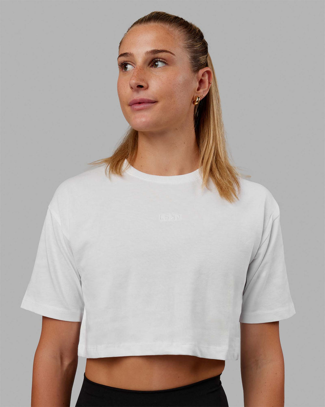 Woman wearing MVP Heavyweight Cropped Tee - White - view 1