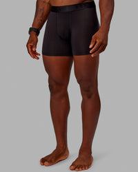 Man wearing MVP Trunks 3 Pack - Black | Thumbnail Index: 4