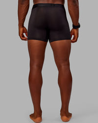 Man wearing MVP Trunks 3 Pack - Black | Thumbnail Index: 2