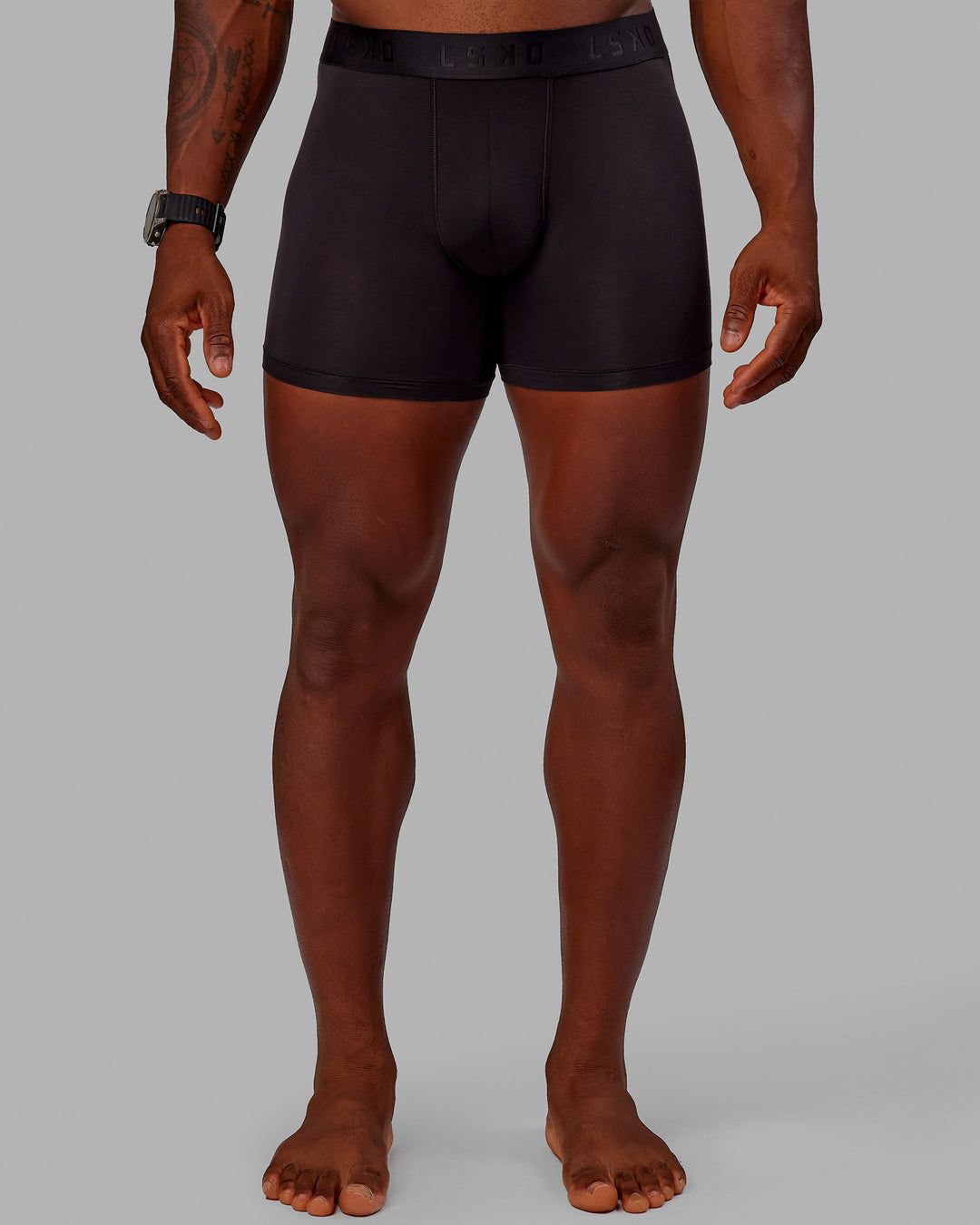 Man wearing MVP Trunks 3 Pack - Black/Cilantro/Midnight Blue - view 4
