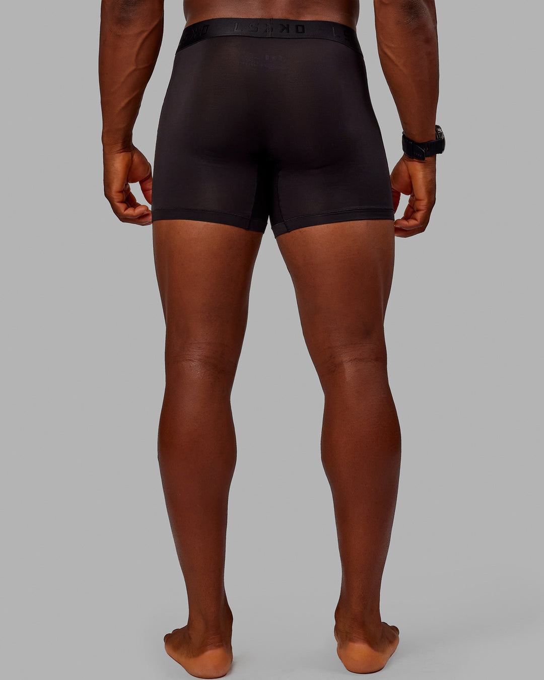 Man wearing MVP Trunks 3 Pack - Black/Cilantro/Midnight Blue - view 13