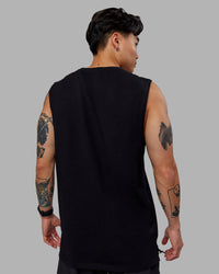 Man wearing 1% Better FLXCotton Training Fit Tank - Black-White | Thumbnail Index: 2