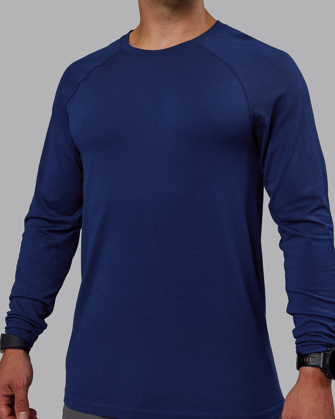 Man wearing AeroFLX+ Seamless Long Sleeve Tee - Midnight Blue/Midnight Blue Marl - view 3
