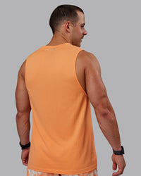 Man wearing AeroFLX+ Seamless Muscle Tank - Cantaloupe/Cantaloupe Marl | Thumbnail Index: 3