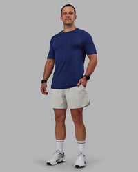 Man wearing AeroFLX+ Seamless Tee - Midnight Blue/Midnight Blue Marl | Model:Jakob | Size:S | Thumbnail Index: 0