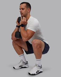 Man wearing AeroFLX+ Seamless Tee - Off White/Off White Marl | Thumbnail Index: 2