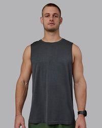 Man wearing AeroFLX+ Seamless Muscle Tank - Pirate Black Marl | Thumbnail Index: 3