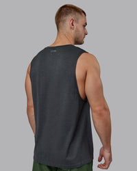 Man wearing AeroFLX+ Seamless Muscle Tank - Pirate Black Marl | Thumbnail Index: 7
