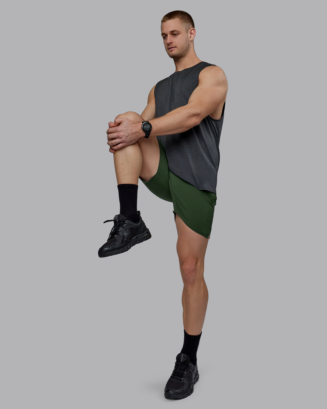 Man wearing AeroFLX+ Seamless Muscle Tank - Pirate Black Marl - view 7