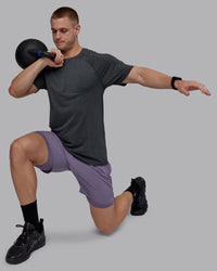 Man wearing AeroFLX+ Seamless Tee - Pirate Black Marl | Thumbnail Index: 7