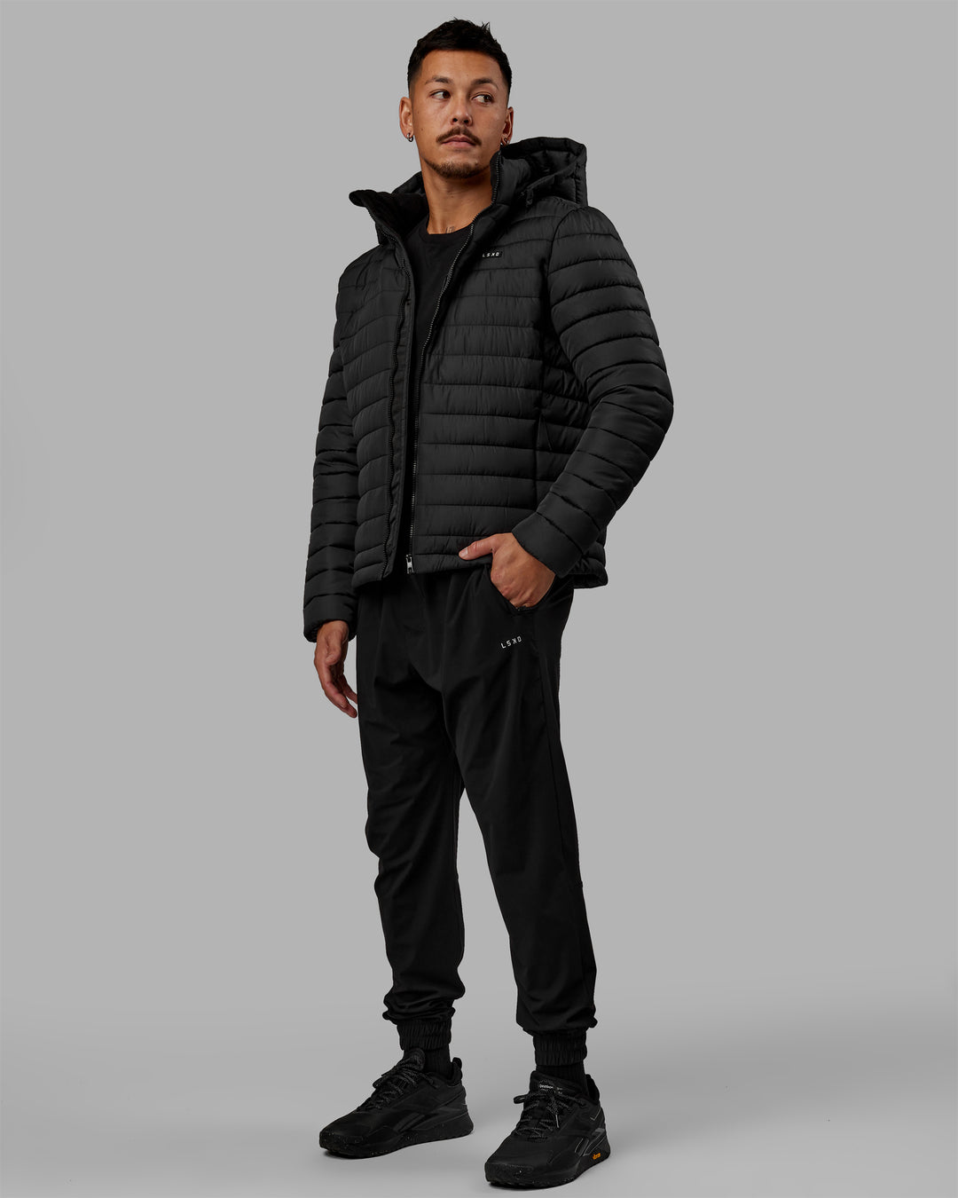 Man wearing All-day Puffer Jacket - Black - view 11