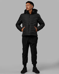 Man wearing All-day Puffer Jacket - Black | Thumbnail Index: 8