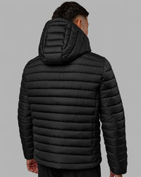 Man wearing All-day Puffer Jacket - Black | Thumbnail Index: 7