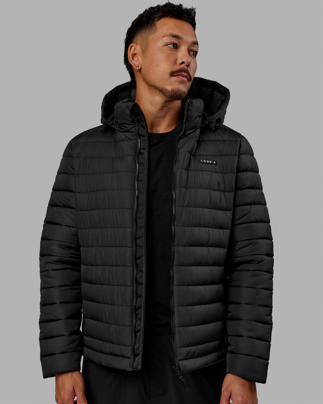 Man wearing All-day Puffer Jacket - Black - view 1