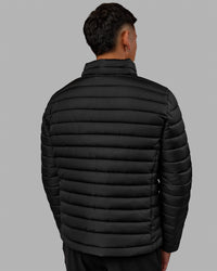 Man wearing All-day Puffer Jacket - Black | Thumbnail Index: 3