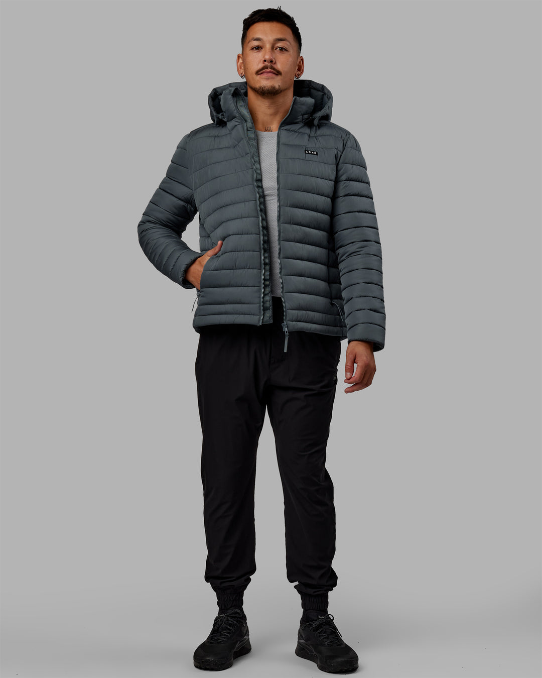 Man wearing All Day Puffer Jacket - Storm - view 2