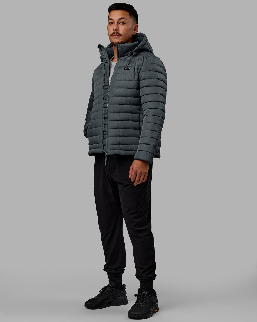 Man wearing All Day Puffer Jacket - Storm - view 9