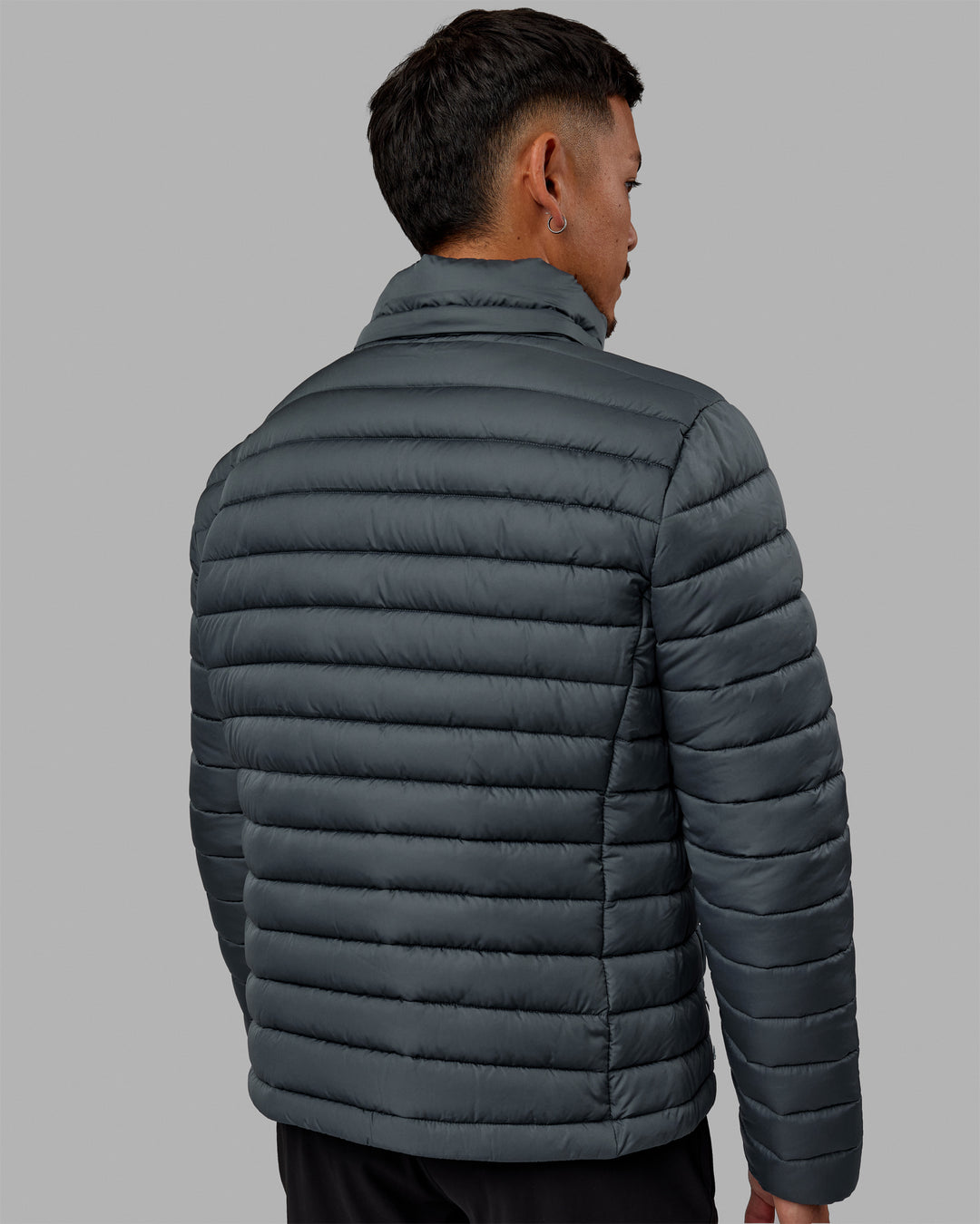 Man wearing All Day Puffer Jacket - Storm - view 3