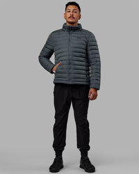 Man wearing All Day Puffer Jacket - Storm | Thumbnail Index: 9