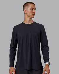 Man wearing Cadence Long Sleeve Tee - Black | Thumbnail Index: 0