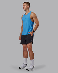 Man wearing Cadence Tank - Azure Blue | Thumbnail Index: 1