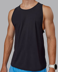 Man wearing Cadence Tank - Black | Thumbnail Index: 7