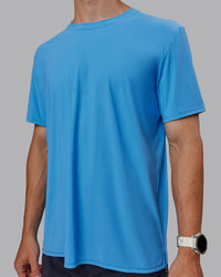 Man wearing Cadence Tee - Azure Blue | Thumbnail Index: 7