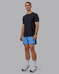 Man wearing Cadence Tee - Black | Thumbnail Index: 1