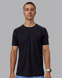Man wearing Cadence Tee - Black | Thumbnail Index: 0