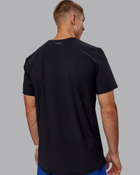 Man wearing Cadence Tee - Black | Thumbnail Index: 3