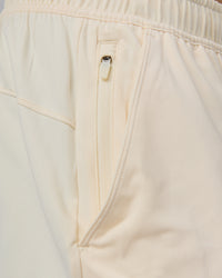 Man wearing Restore 6" CloudFLX Shorts - Ivory | Thumbnail Index: 5