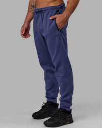 Man wearing Athlete ForgedFleece Zip Track Pants - Future Dusk | Thumbnail Index: 5