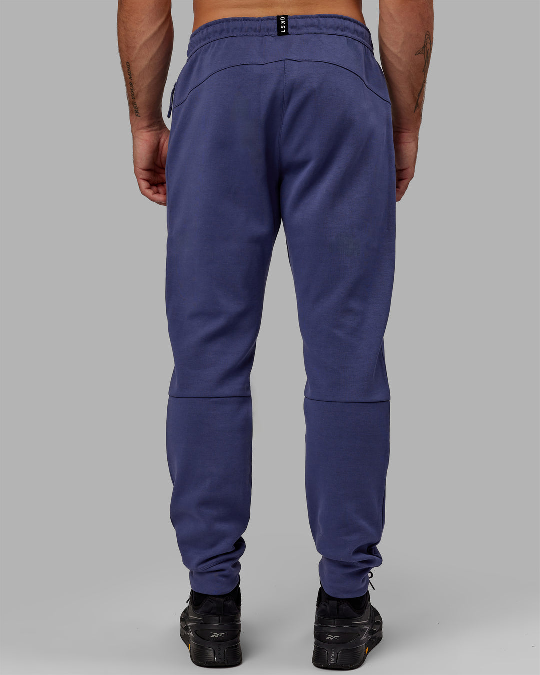 Man wearing Athlete ForgedFleece Zip Track Pants - Future Dusk - view 4