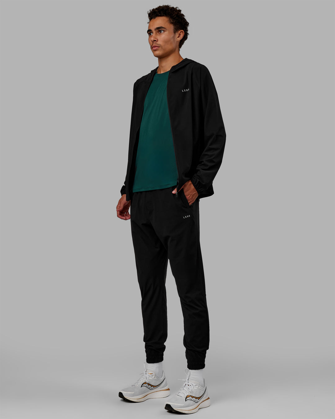 Man wearing Train-Lite FLXMAX Jacket - Black - view 7