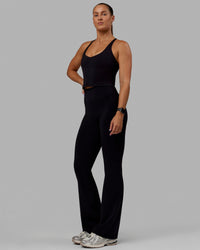 Woman wearing Movement Active Tank - Black | Thumbnail Index: 3