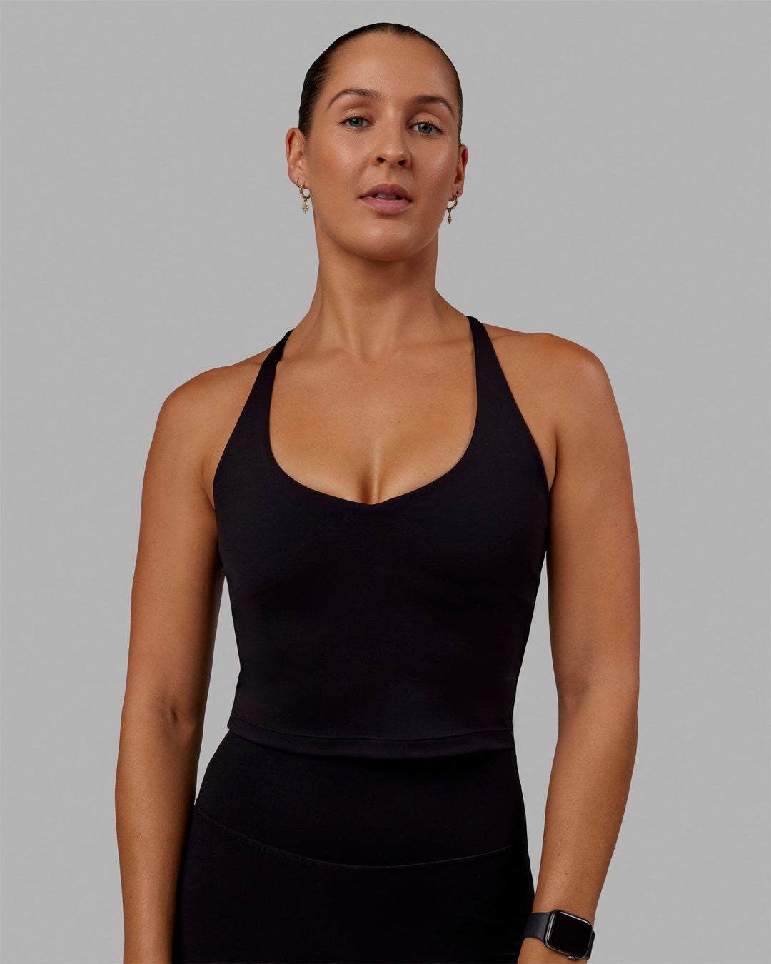 Woman wearing Movement Active Tank - Black - view 1