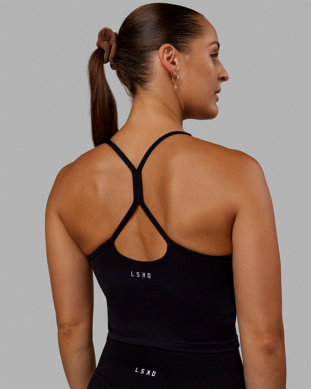 Woman wearing Movement Active Tank - Black - view 3