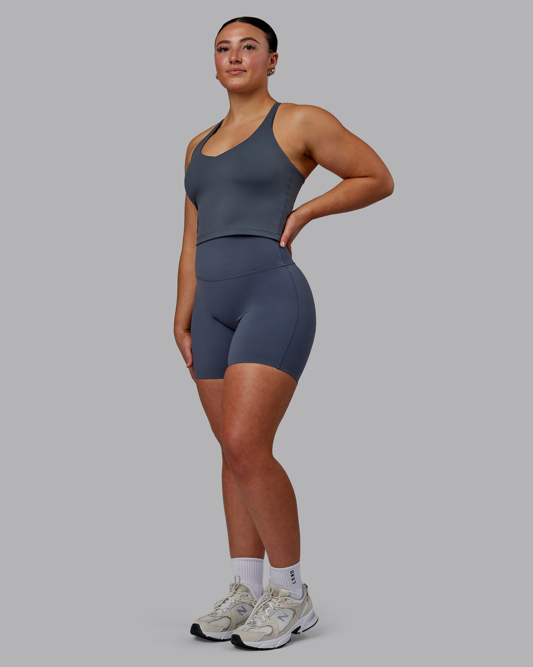 Woman wearing Movement Active Tank - Turbulence - view 1