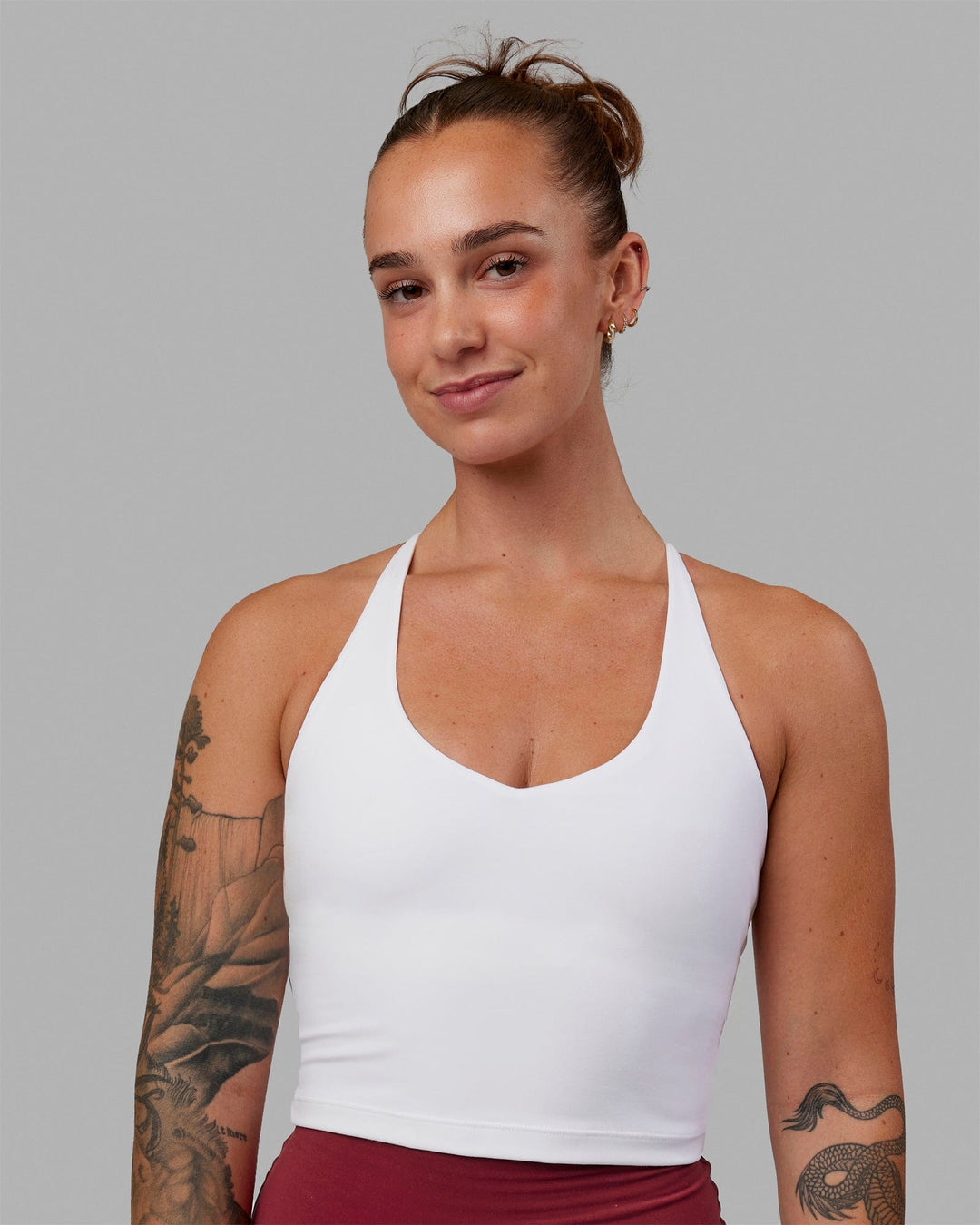 Woman wearing Movement Active Tank - White - view 1