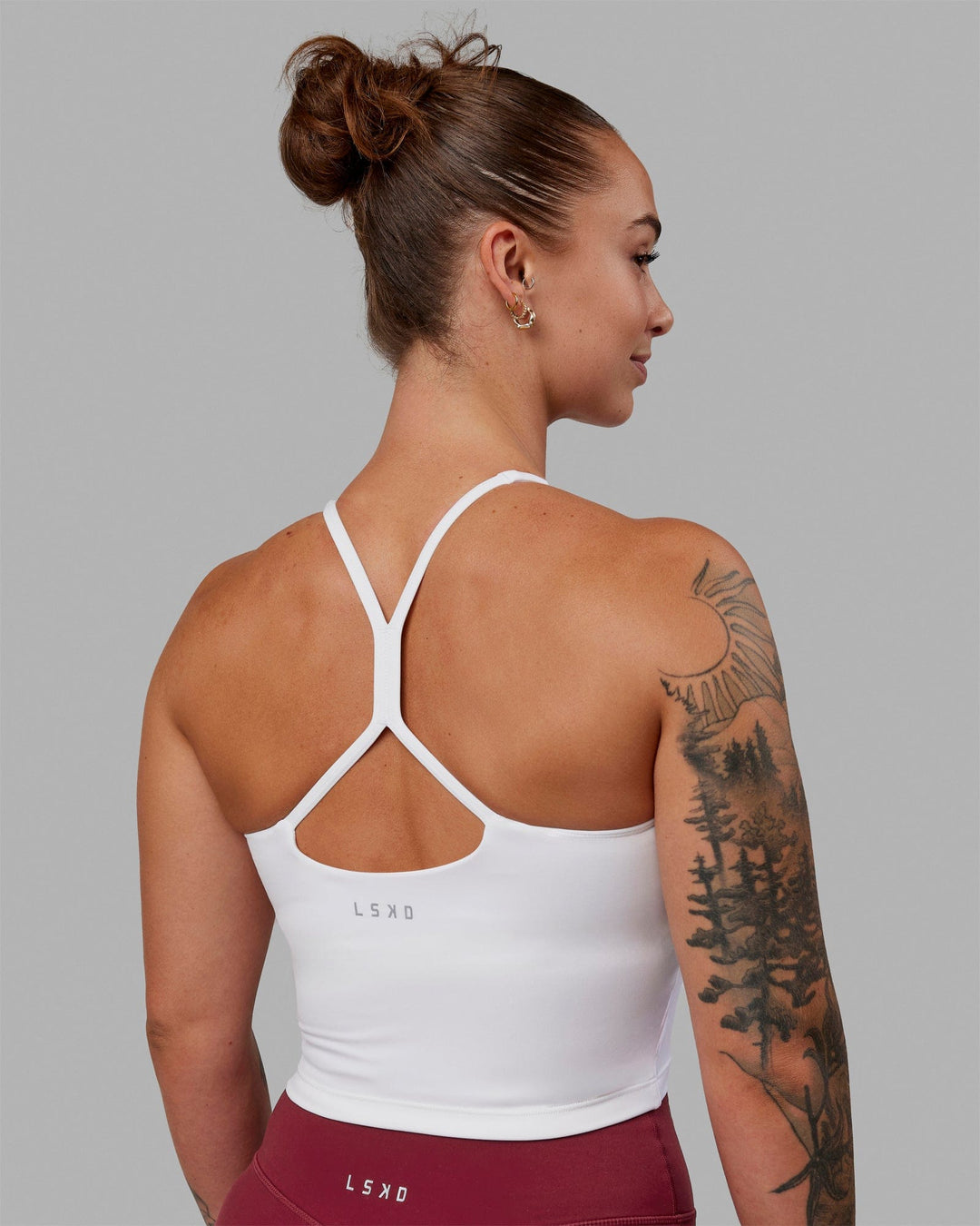 Woman wearing Movement Active Tank - White - view 3