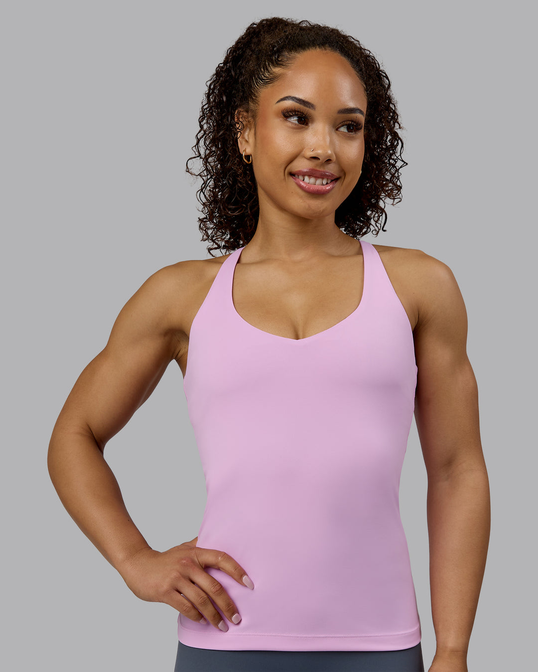 Woman wearing Movement Longline Active Shelf Bra Tank - Pastel Orchid - view 1