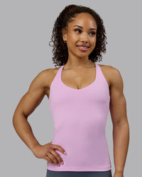 Woman wearing Movement Longline Active Shelf Bra Tank - Pastel Orchid | Thumbnail Index: 0