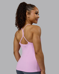 Woman wearing Movement Longline Active Shelf Bra Tank - Pastel Orchid | Thumbnail Index: 1