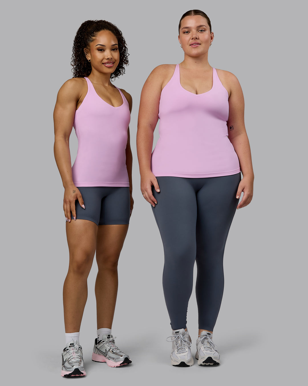 Woman wearing Movement Longline Active Shelf Bra Tank - Pastel Orchid - view 7